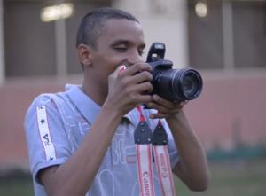 HEI Scholar Hussein Oraby with camera