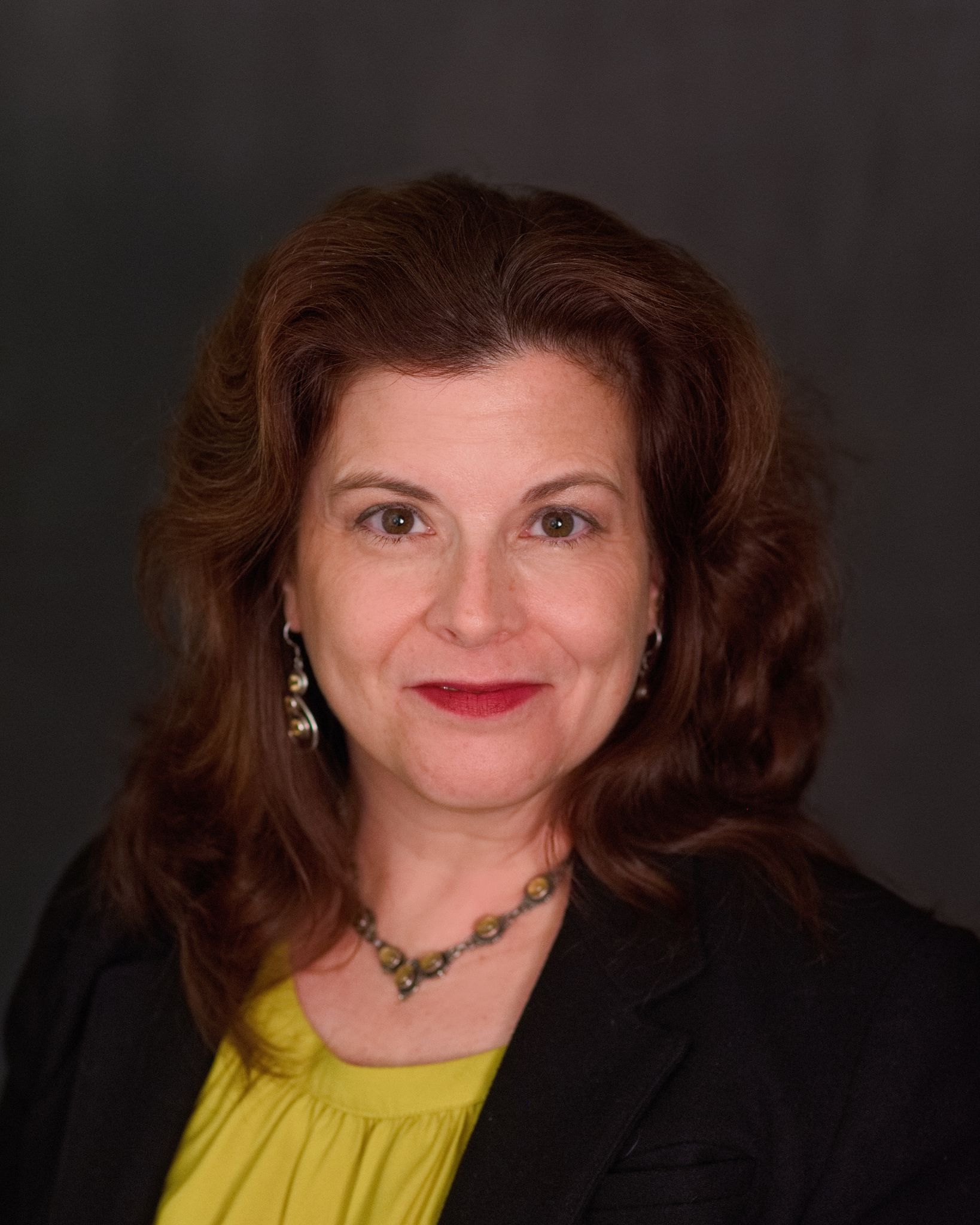 Headshot of Dr. Elena Corbett