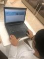 YEP Student working on laptop