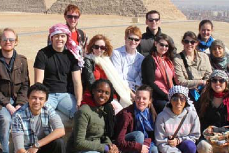AMIDEAST/Egypt abroad students pose in front of the Great Pyramid of Giza.  