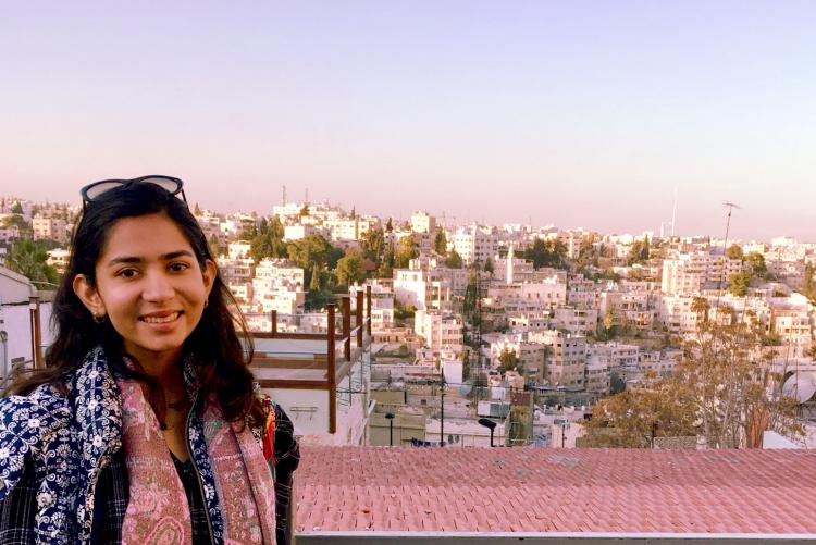 A summer 2018 student with the vista of Amman, Jordan behind her
