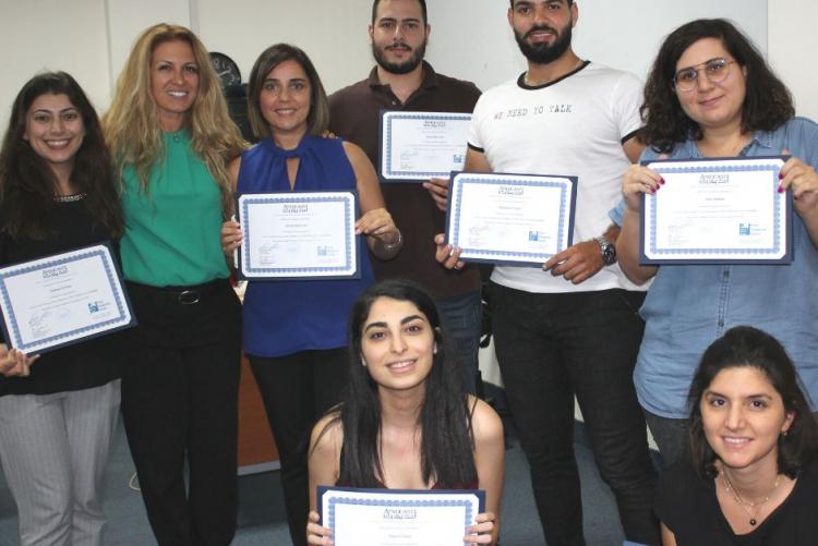 CAPM workshop graduates with their certificates