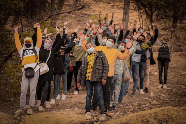 Group of young Libyan participants taking part in a Skills for Tomorrow outdoor activity