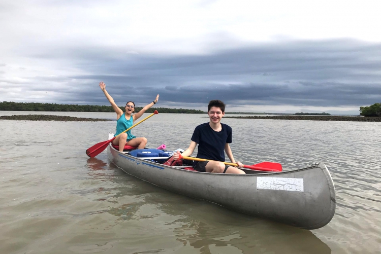 DKSSF student Nour and a friend riding in a canoe on a lake