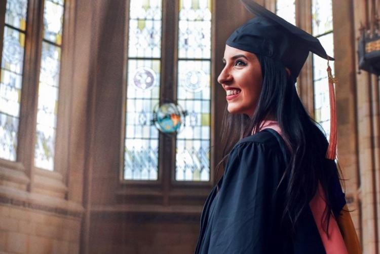 Tunisian female student in gap and gown