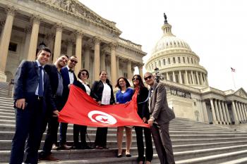 Group of  Tunisian Professional Fellows standing in front of the US Capitol