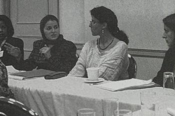 Four women sitting at a table 