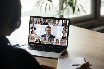 Photo of person looking at monitor