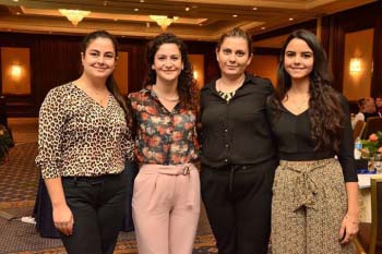 Four women at a conference