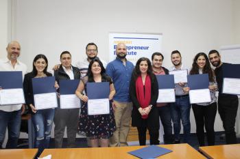 SYOB workshop participants holding their certificates