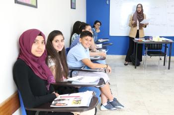 Teens smiling during class