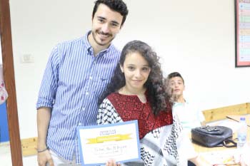 Student and teacher holding course certificate