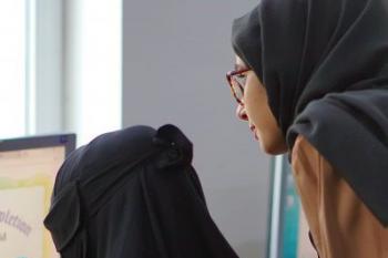 Two female students are  doing a virtual call 