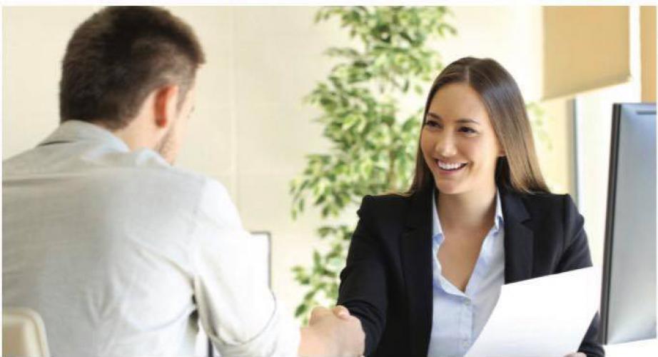 Recruiter shaking hands with candidate