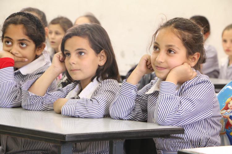 Young female students in a classroom setting