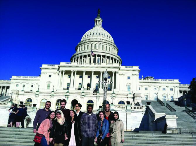 A group of Moroccans posing for a group photo outside the House of Congress in Washington D.C. 