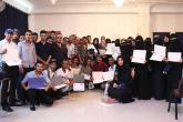 Graduation photo of a large group of Nahdhat Shabab Project students