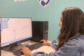 Female student working on a computer