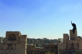 A student exploring the Roman ruins of Amman