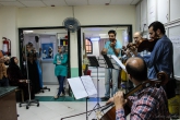 A musical string quartet performs 