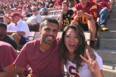 Male and Female student at a football game