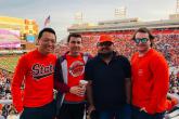 Four students at a football game