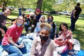 Group of students outside at a picnic