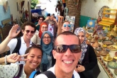 Students in a group photo in the Rabat medina