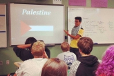 YES student giving presentation about Palestine