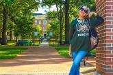 Female student poses on the Ohio University campus