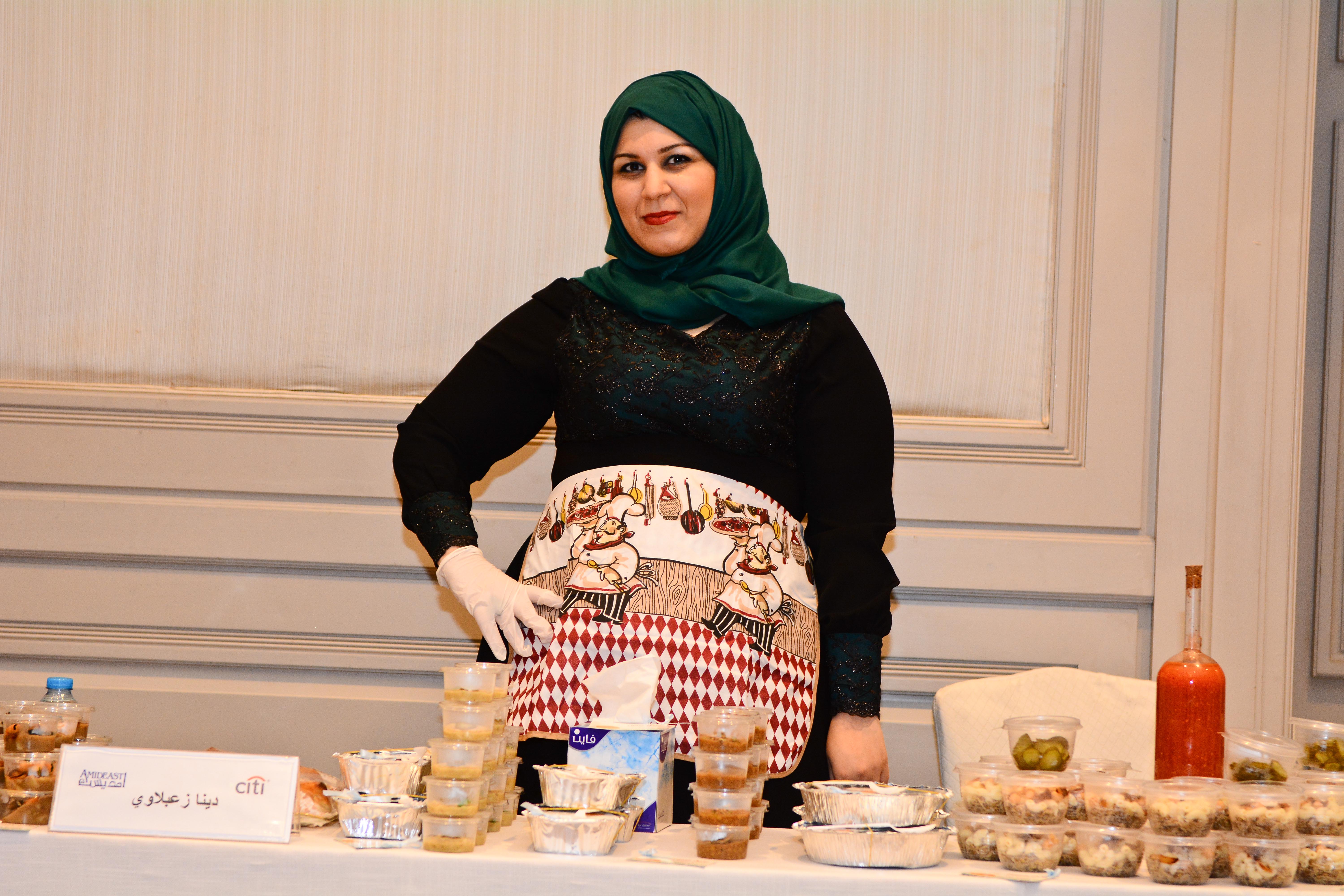“My experience in AWEP made a difference in my ability to launch my business,” says Dina Zabalawi, displaying her food products at an AWEP showcase event in Jordan.