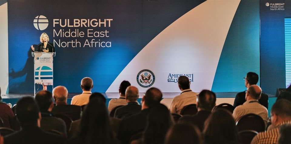 AMIDEAST 's country director for Tunisia, Jennifer Smith, delivering welcome remarks