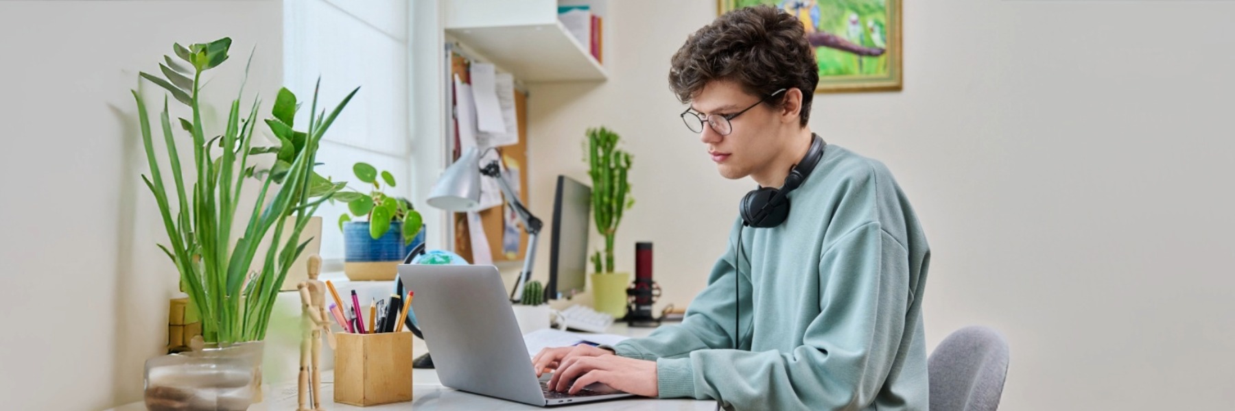Student  studying for the CLEP test on a laptop.