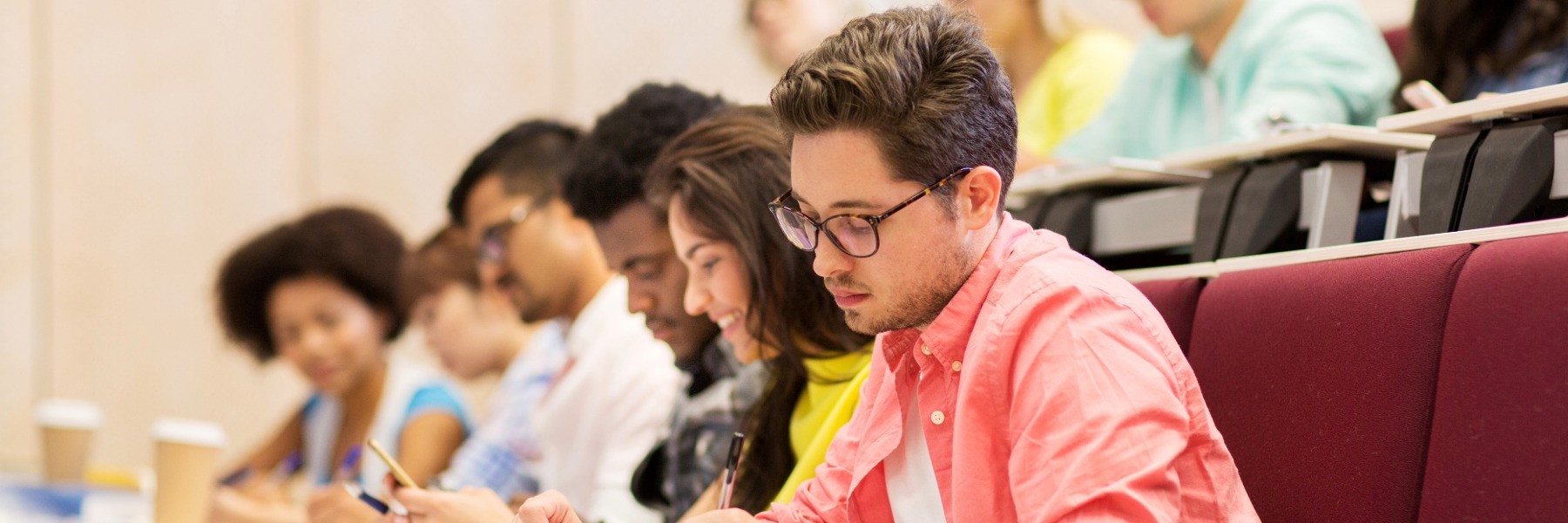 University students in an amphitheater .TOEFL Test