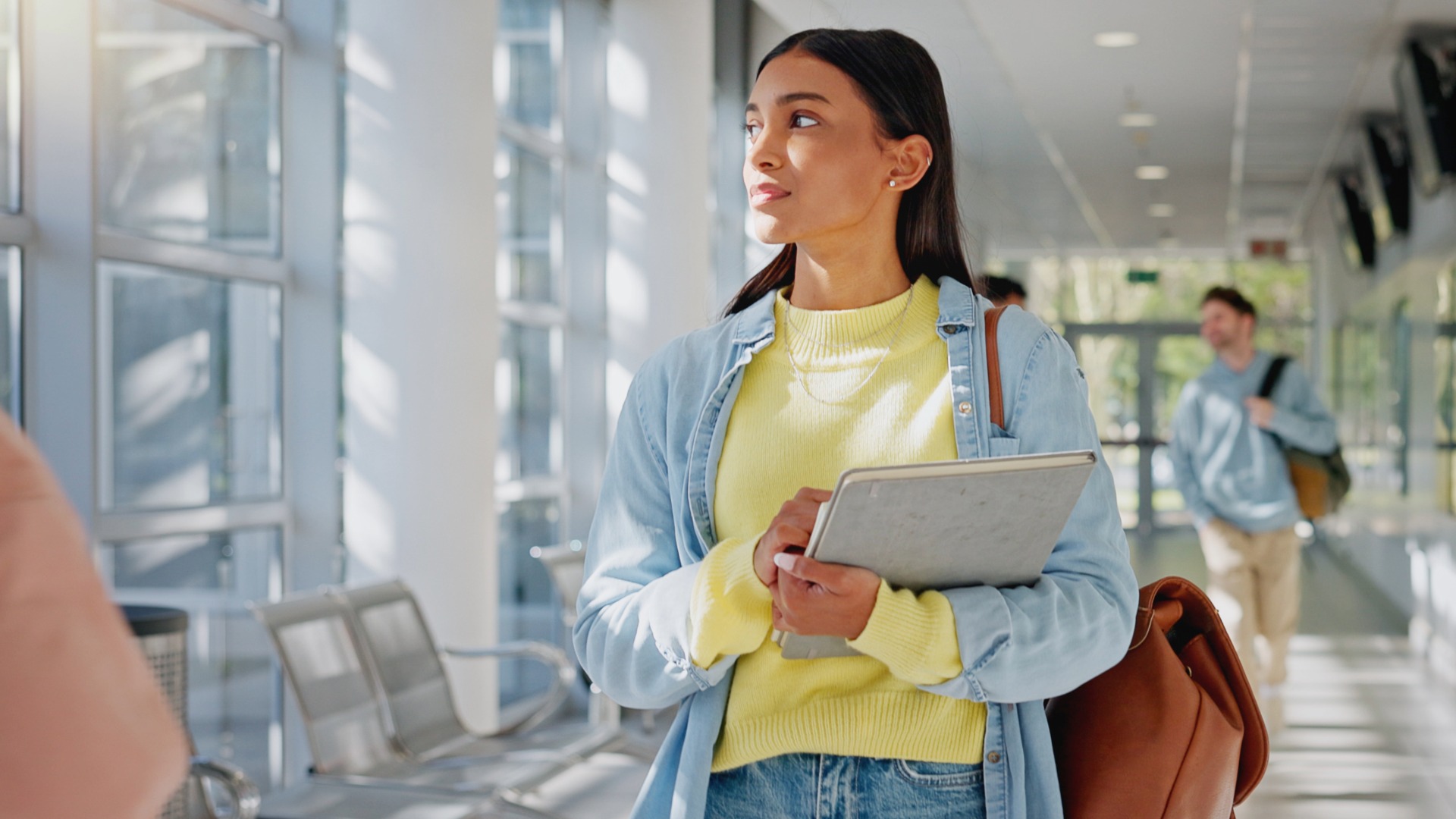 Woman, thinking and walking to university class, education and student for studying on campus. Female person, backpack and start of learning for knowledge, academy and planning future at college