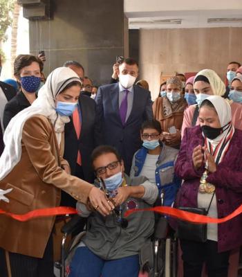 group of men and women at ribbon cutting ceremony