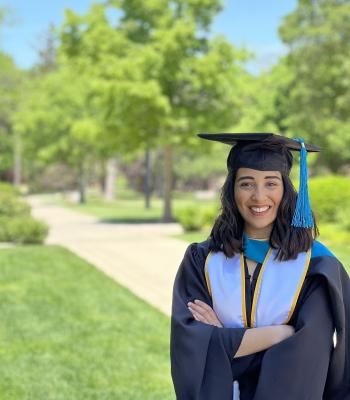 Woman with cap and gown.