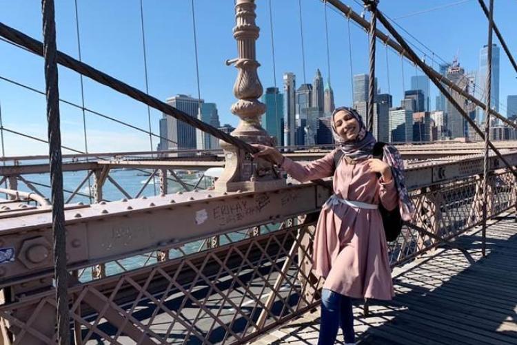 Female on Brooklyn Bridge