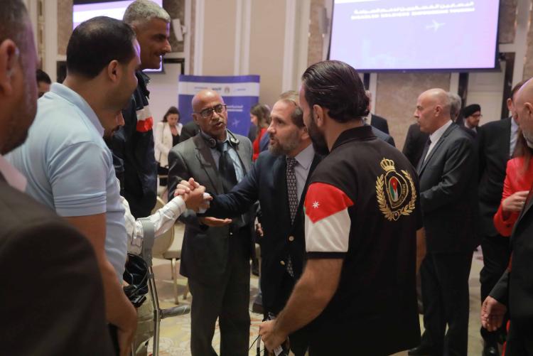 Prince Mired with program participants during launch event