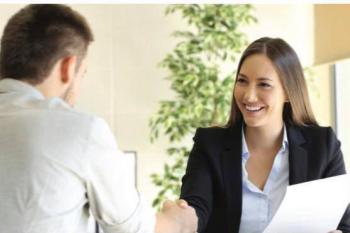 Recruiter shaking hands with candidate