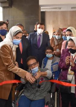 group of men and women at ribbon cutting ceremony